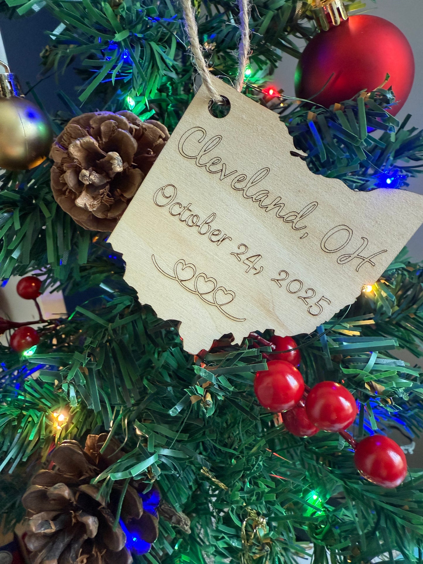 Christmas ornament with wedding date, city, and state