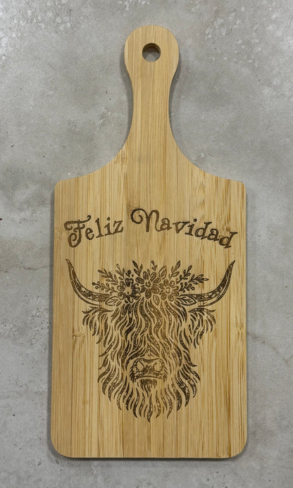 Feliz Navidad Highland Cow Cutting Board