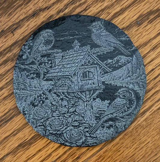 Two Cardinal Watching Their Birdhouse Round Coaster